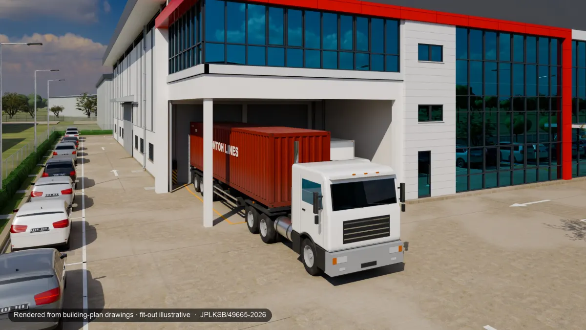 A 40-ft container trailer reversed up to a dock roller shutter under the office undercroft